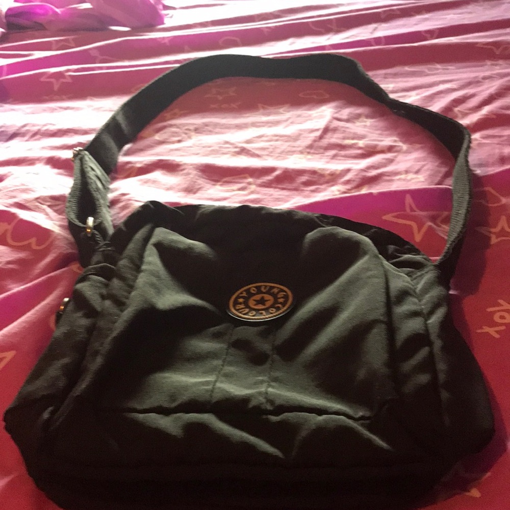 A young colour Crossbody